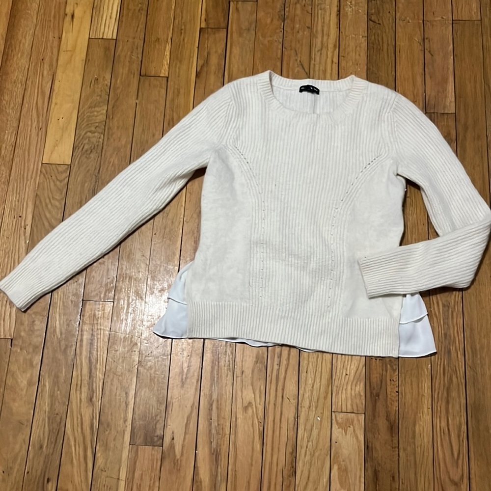 Club Monaco cream sweater with back ruffle